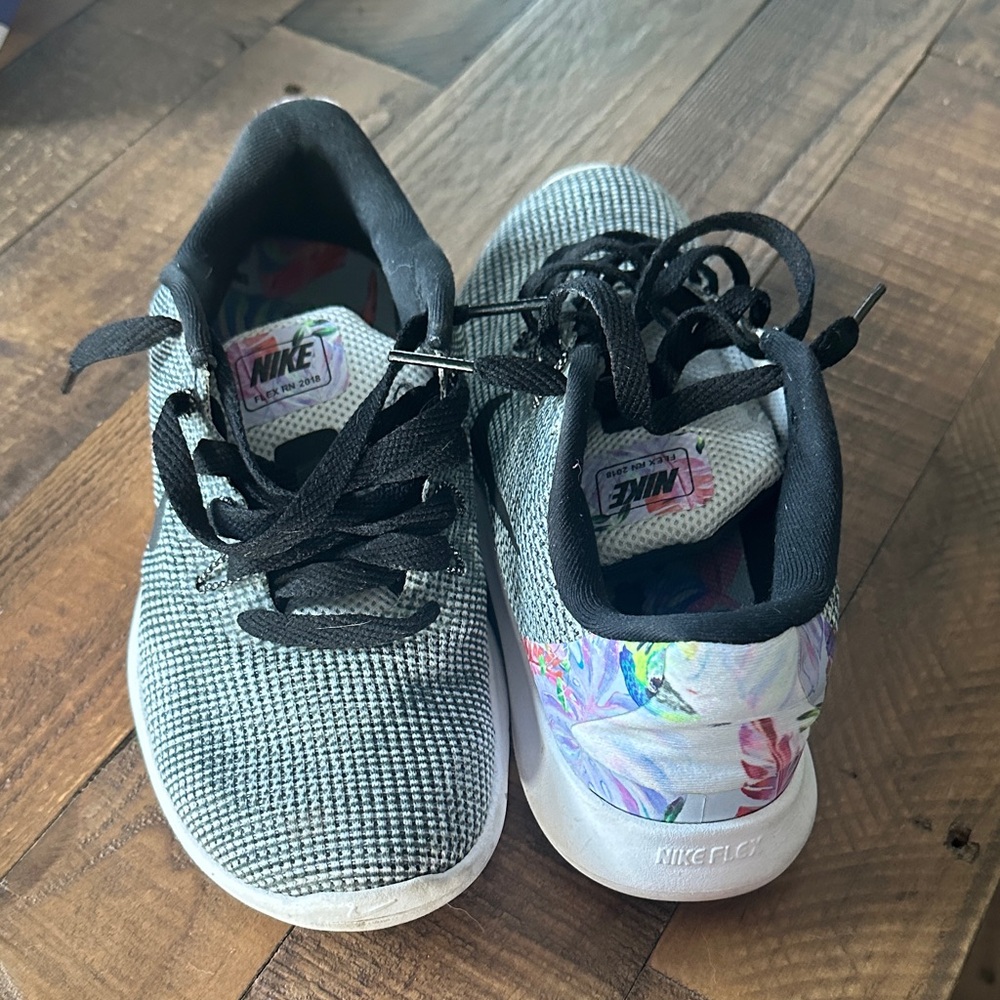 Nike Women’s Black and Gray Sneakers with Floral Accents